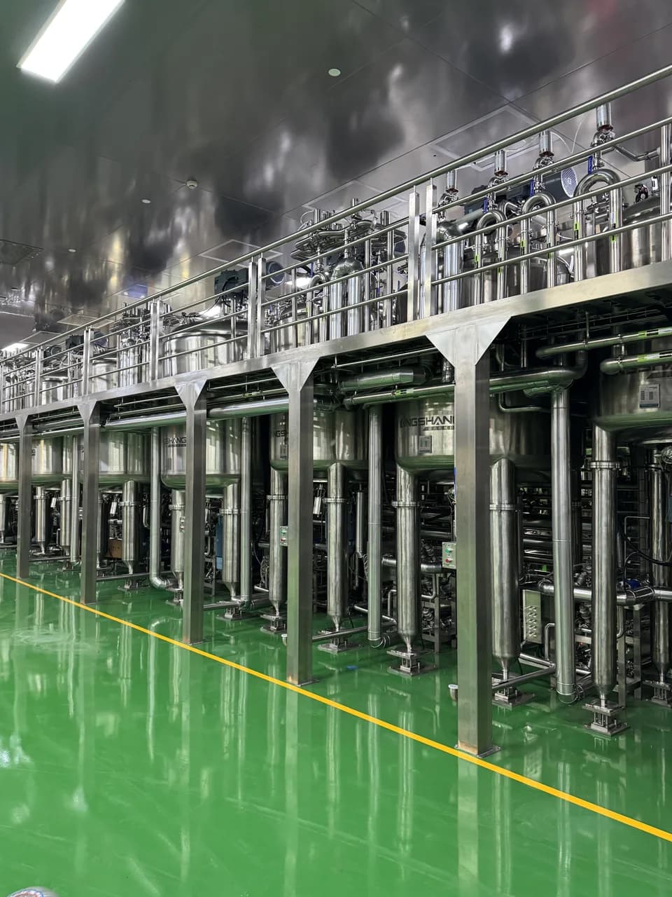 King Metis clean compounding workshop with stainless steel cosmetic production tanks